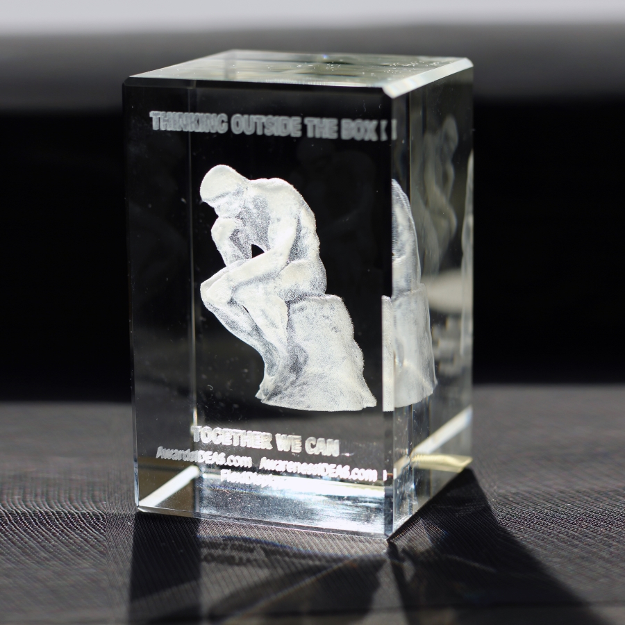 Three D printed thinker image within a custom crystal award