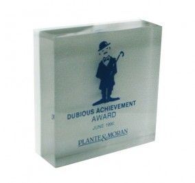 Custom Lucite embedment award with charley chaplain theme.