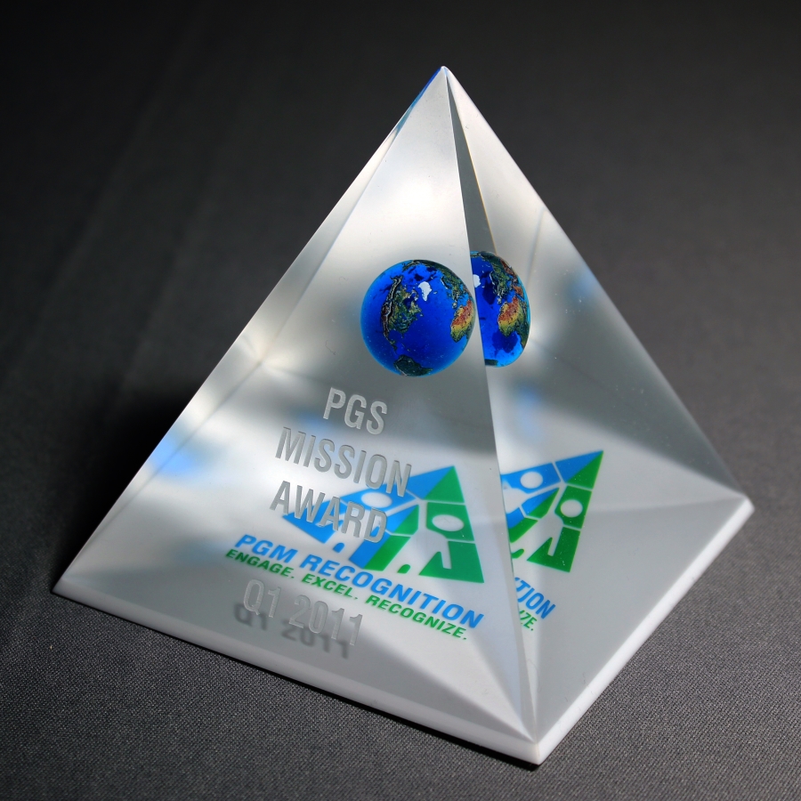 Custom shaped pyramid Lucite award with embedment