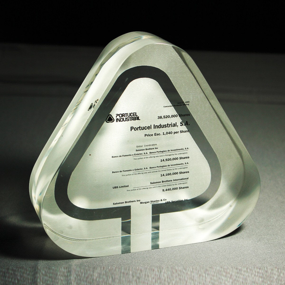 Custom shaped Lucite trophy or award with embedment