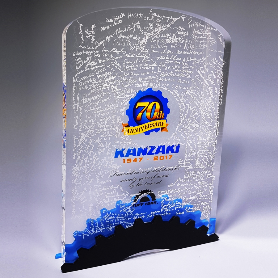 Custom Lucite signatures with black and blue gear trophy award