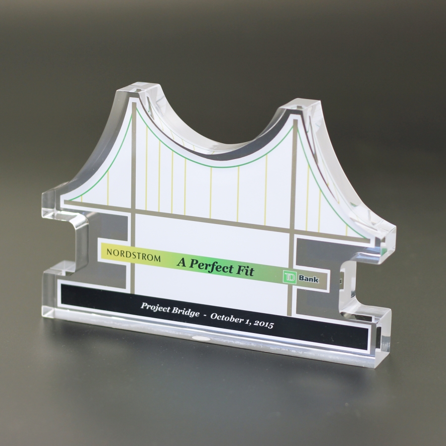 Custom bridge-shaped Lucite embedment